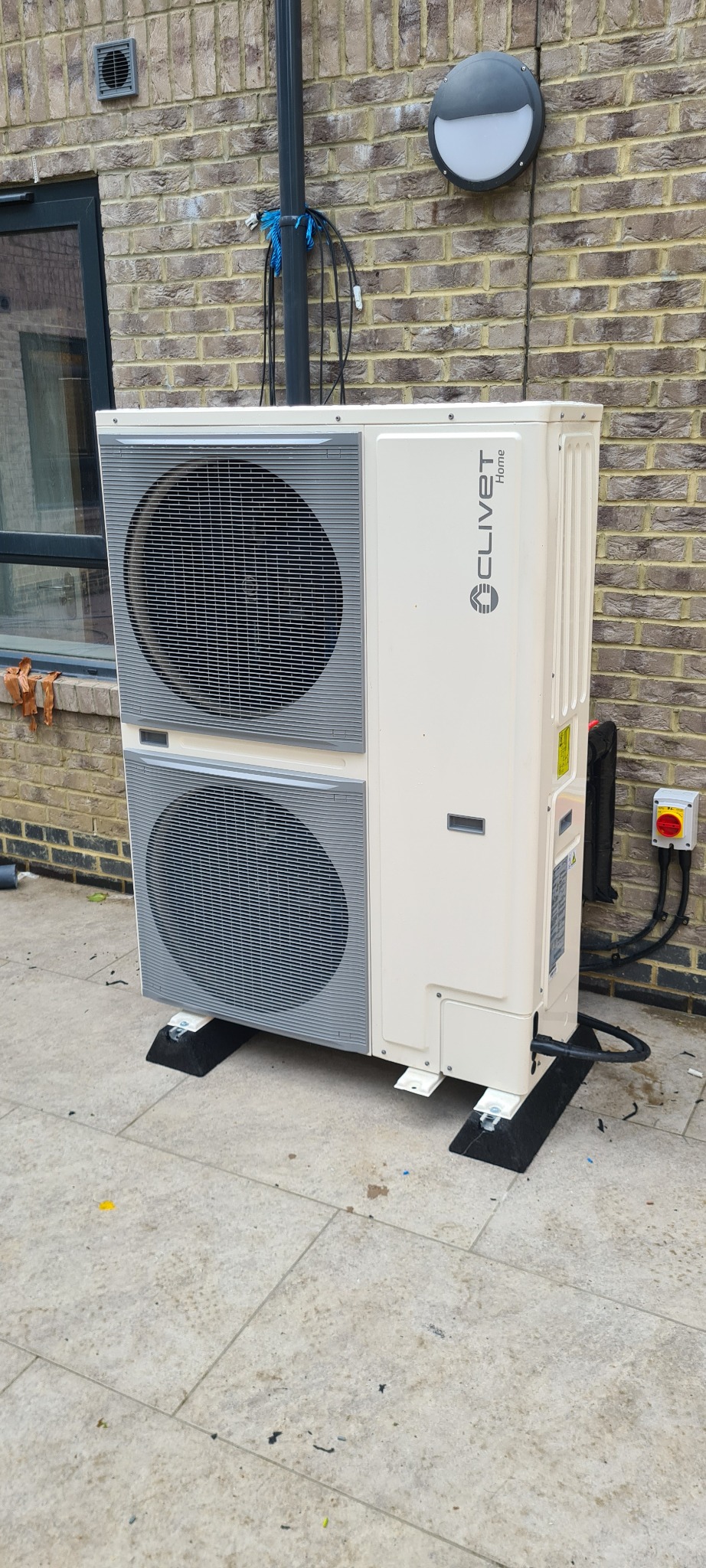 Plant room with insulated pipework and hot water cylinder